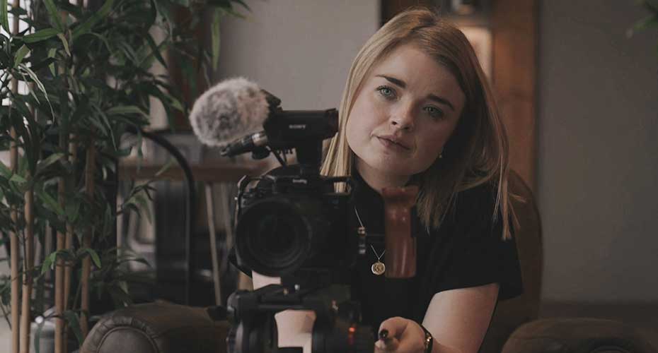 Megan Davies with a camera